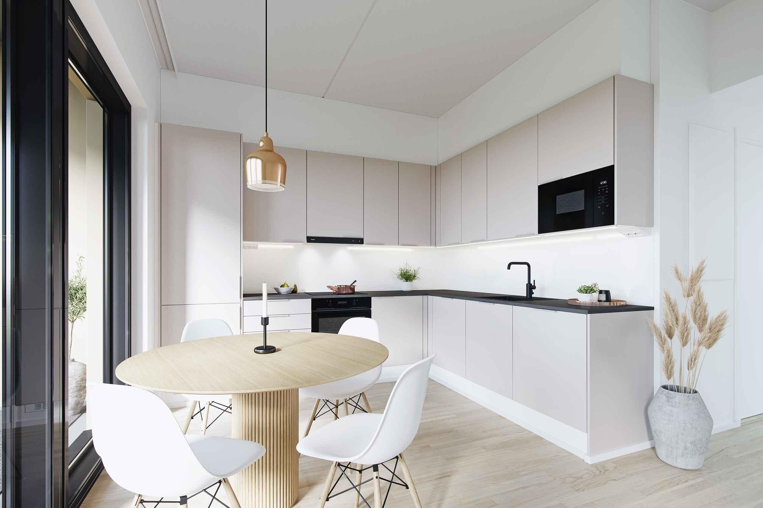 Villojen asuntojen hiekasävyinen keittiö