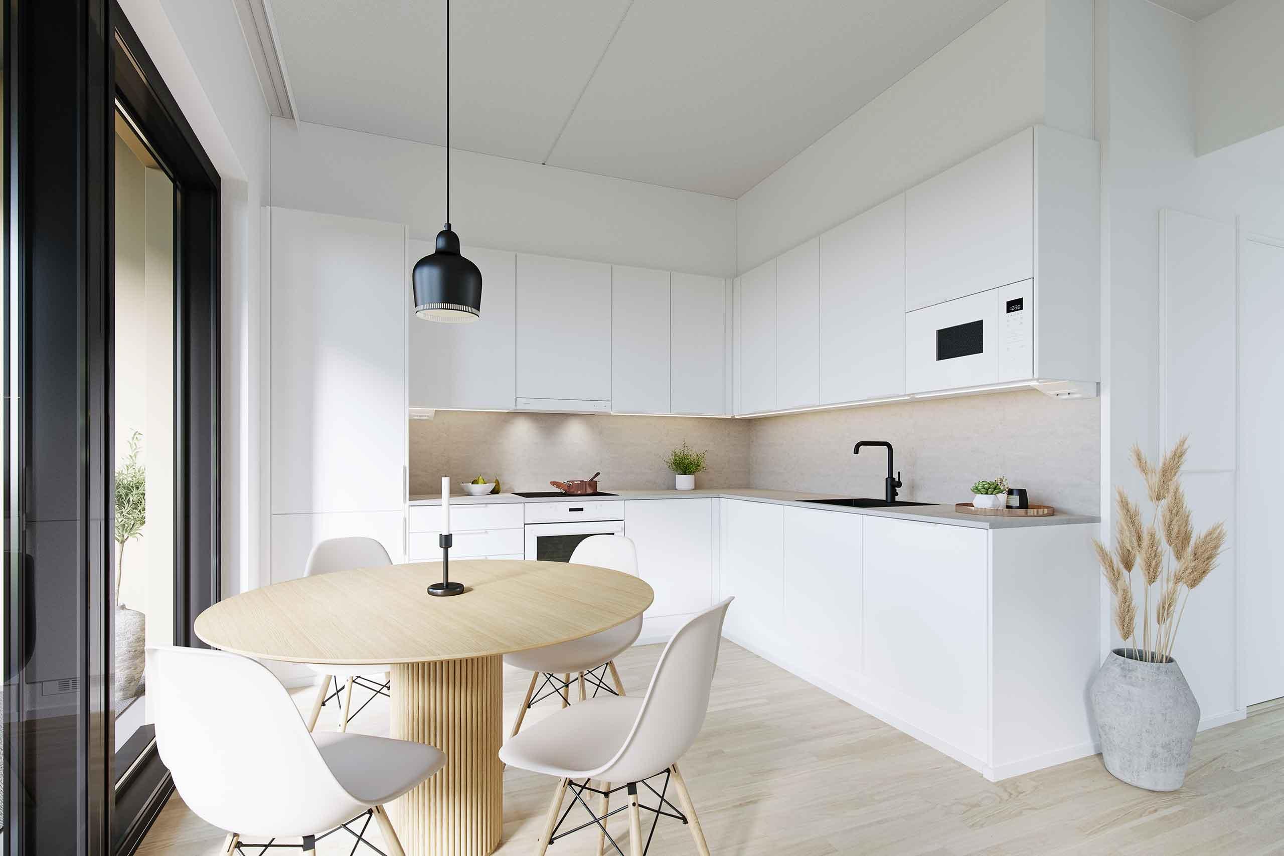 Villojen asuntojen valkoinen keittiö