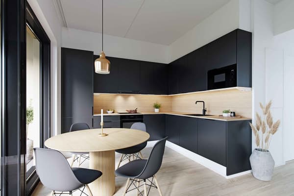 Villojen asuntojen musta keittiö