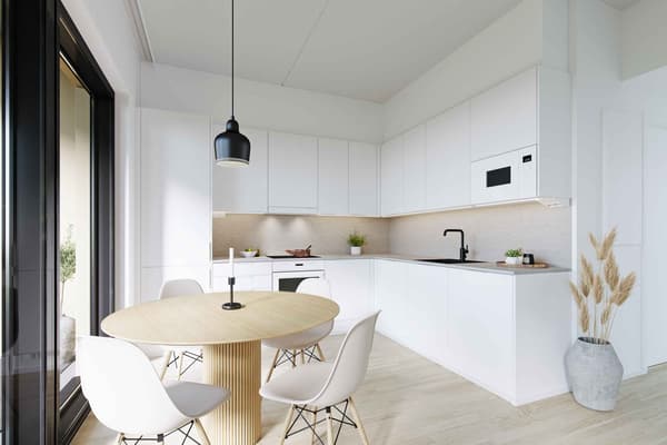 Villojen asuntojen valkoinen keittiö