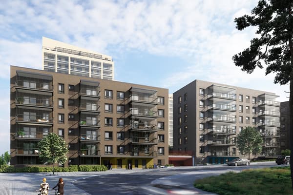 Asunto Oy Espoon Puustellinpuisto vasemmalla kuvassa